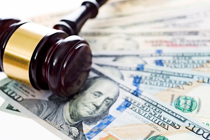 Judge’s gavel resting on U.S. currency, illustrating inheritance and property division in a South Carolina divorce.